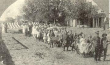Parade going east past A.K. Johnson Harness and Shoe Repair 1920