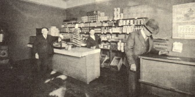 Fosdick Store in February, 1921. (Now the Hooker County Historical Society Buildig) L ro R: Edwin A. Fosdick, Clarence Fosdick, and Perry Ham.