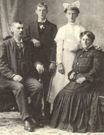 "Toby" and Anna Anderson with children Ralph and May, 1904 Omaha Nebr.