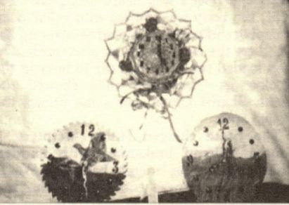 Wanda Smith's crocheted Hat Clock, sawblade clock painted in acrylics and acrylic painting on a slab of tree clock